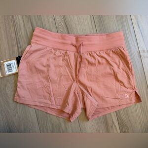 NWT the Northface women’s small rose dawn, flash dry Aphrodite motion shorts
